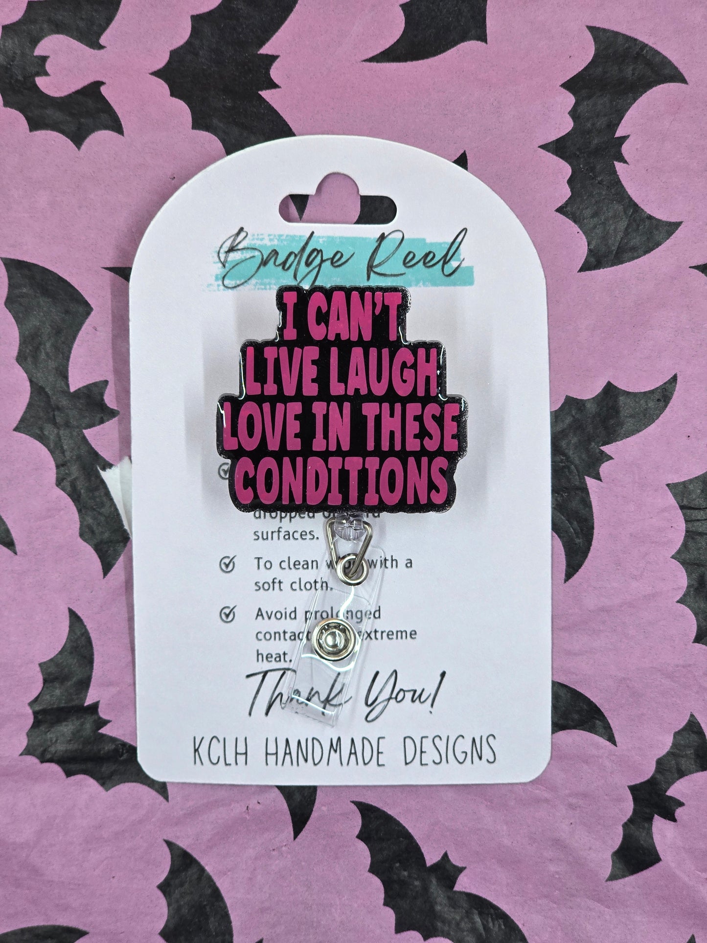 "I can't live, laugh, love" badge reel